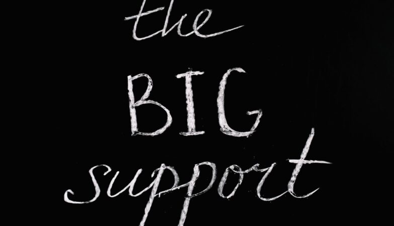 the big support lettering text on black background
